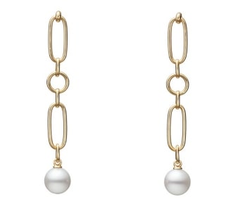 a pair of pearl drop earrings with a gold chain from Mikimoto.