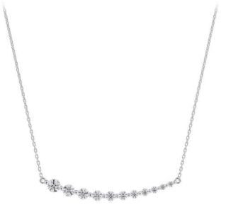 A asymmetrical graduated smile diamond necklace from De Beers Forevermark.