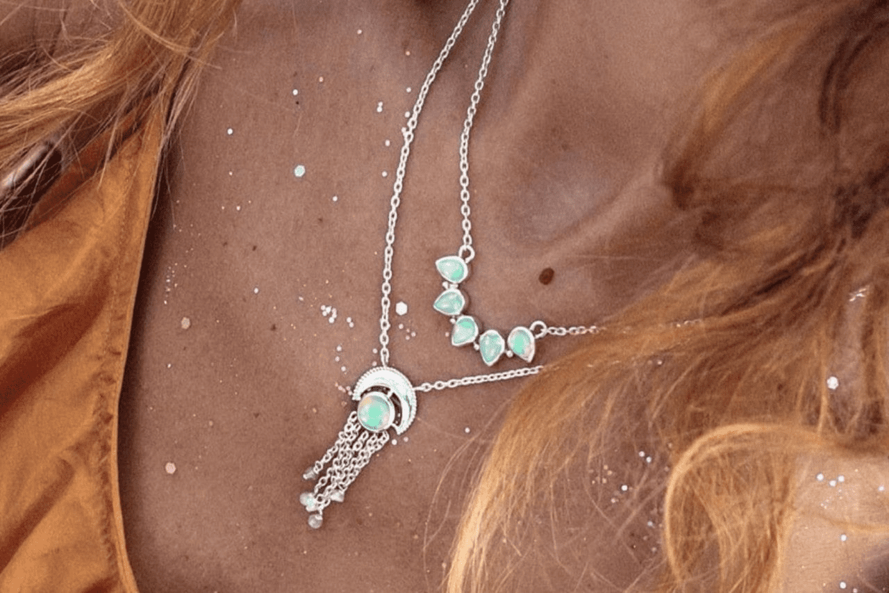 close-up of beautiful white gold and opal chain necklaces