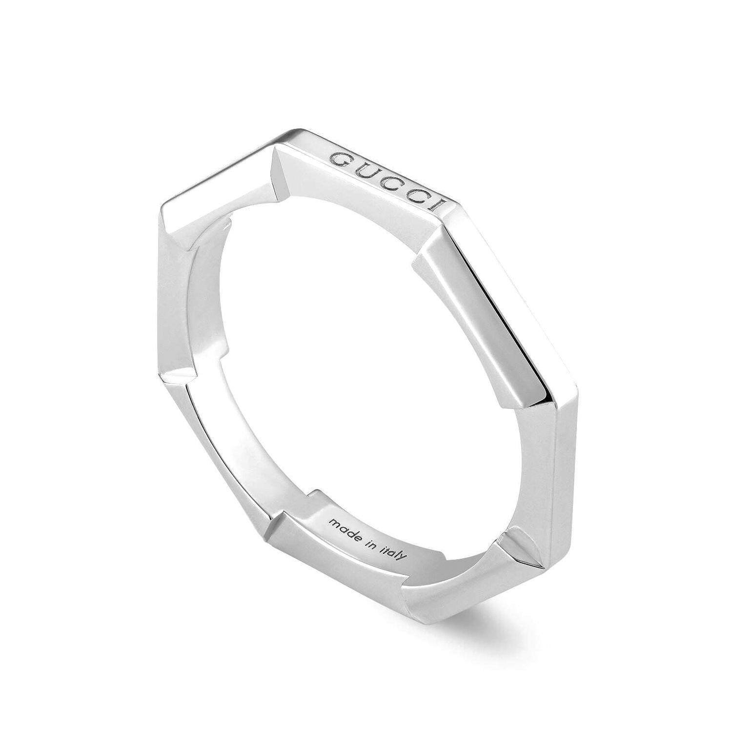 A white gold Gucci ring with mirror finish.