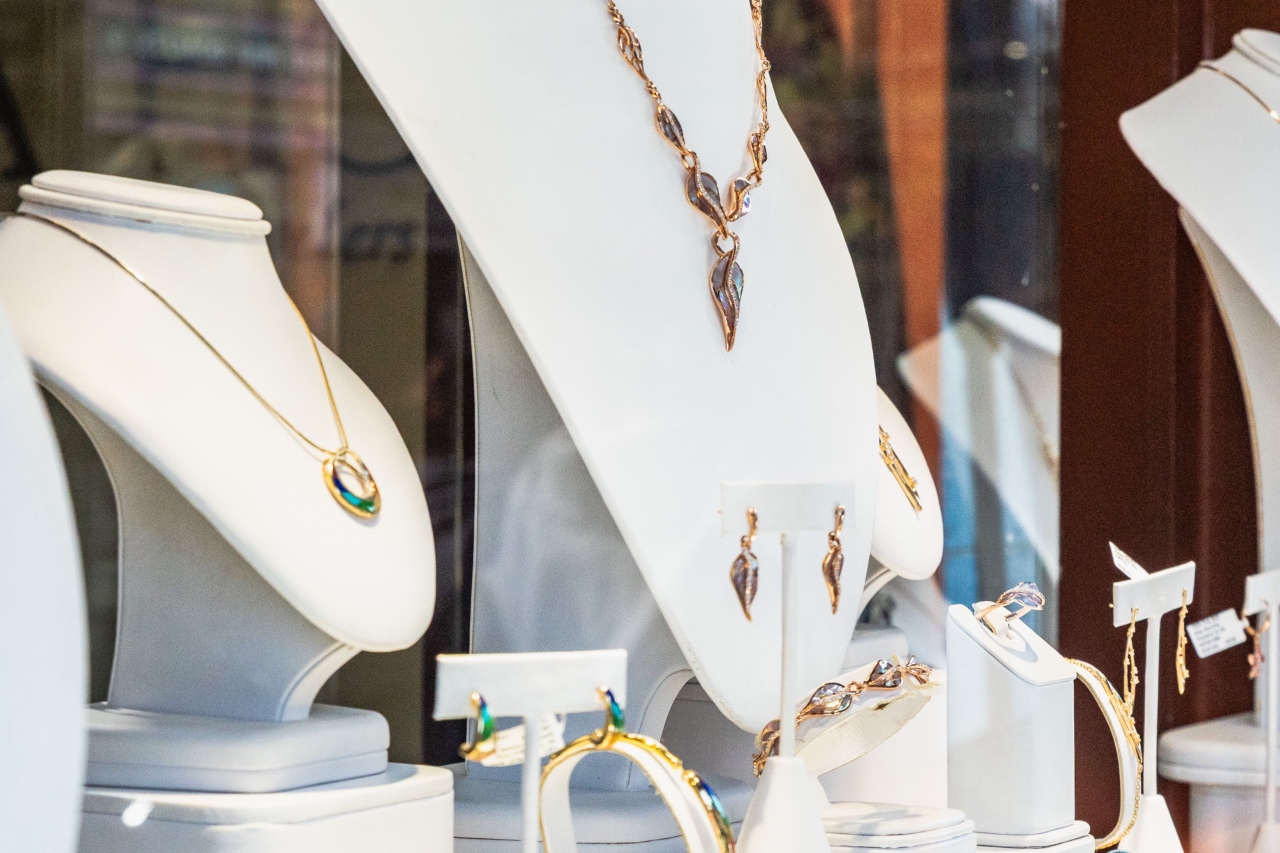 A sunlight jewellery display featuring rose gold gemstone earrings and necklaces.