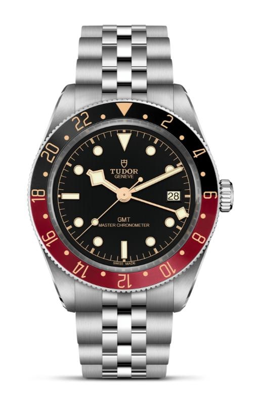 A TUDOR Black Bay 58 GMT watch featuring a stainless steel bracelet, a dual-tone burgundy and black 24-hour bezel, and a black dial with gold-accented snowflake hands.