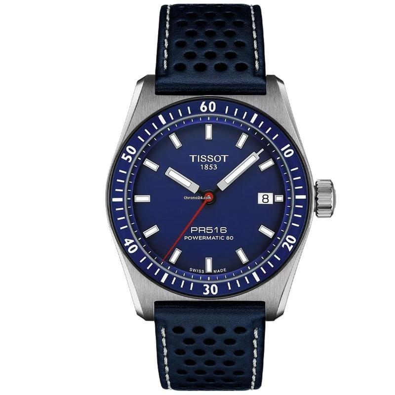 A Tissot watch with deep blue dial, rotating bezel, and matching deep blue leather strap