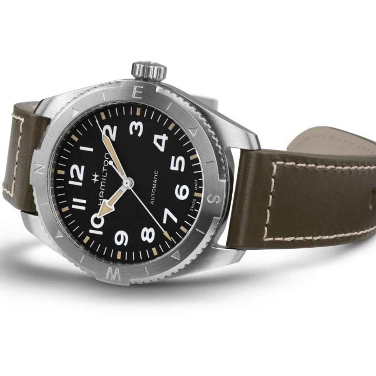A khaki Hamilton watch with black dial and arab numerals